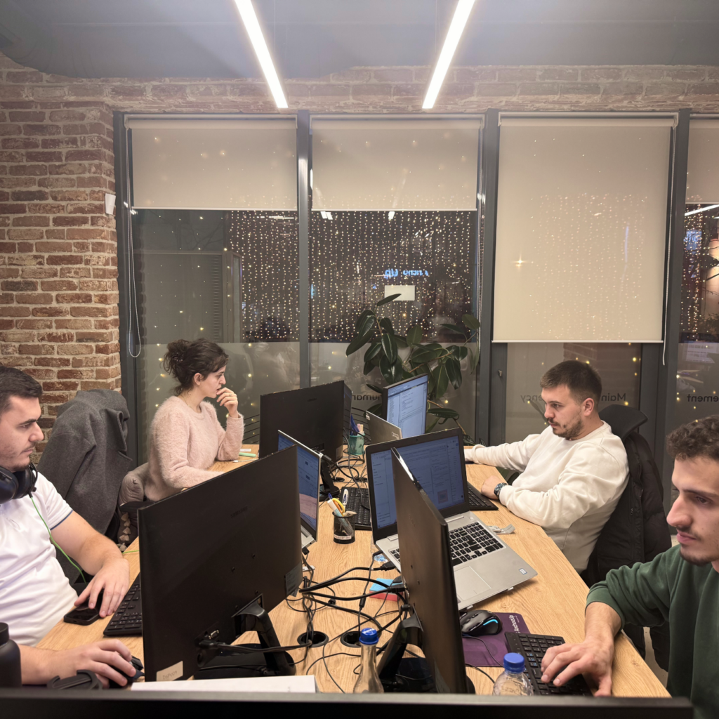 AnchorzUp software developers working together to solve a technical issue