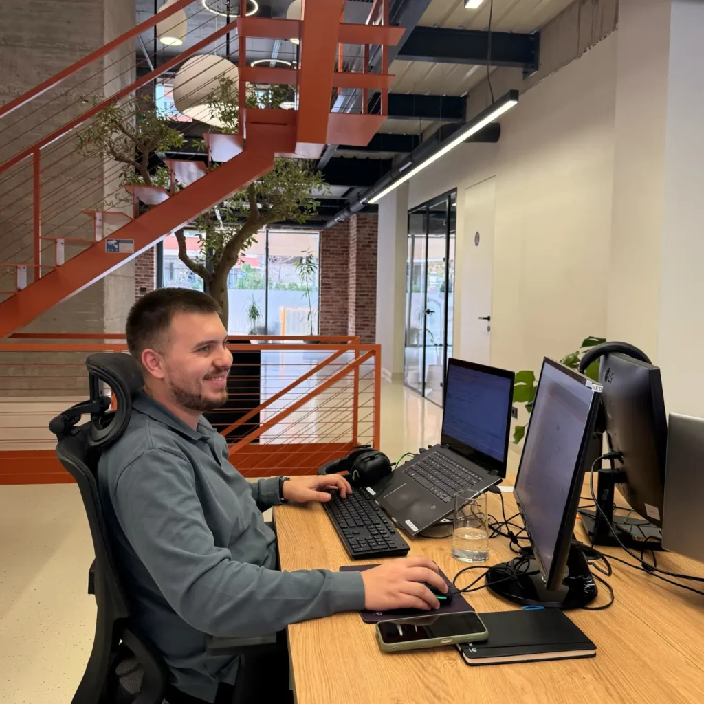 AnchorzUp's team member working at the office