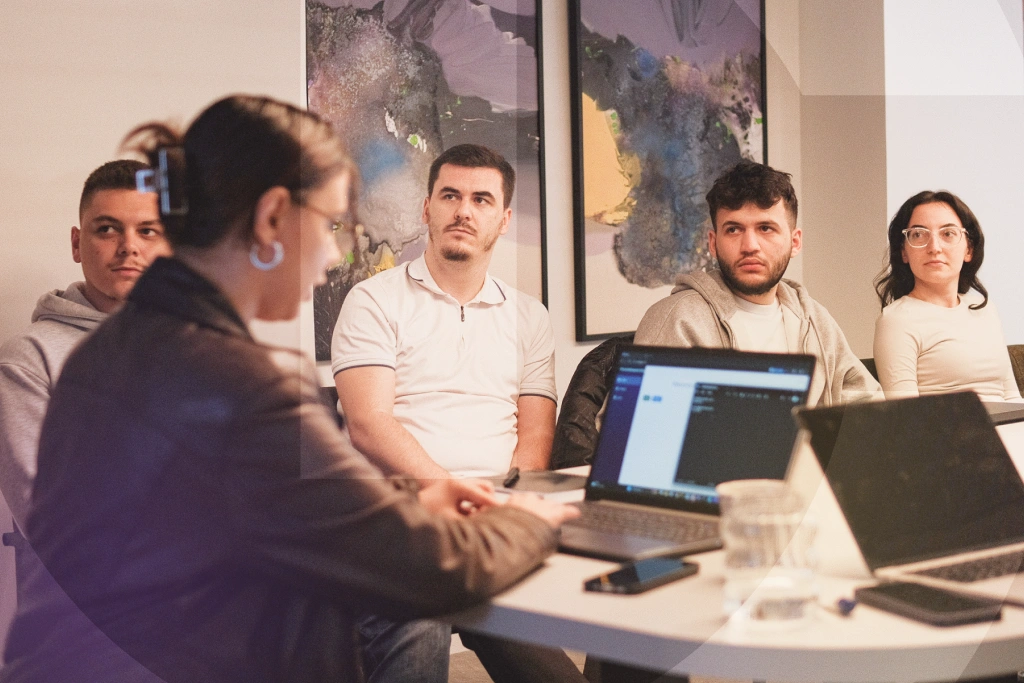 Dedicated software development team collaborating during a product strategy meeting
