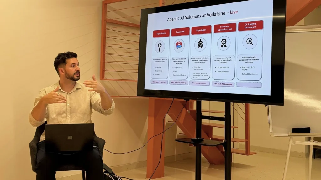 Fatos Ismali presenting a Vodafone UK agentic AI case study during an AnchorzUp guest lecture
